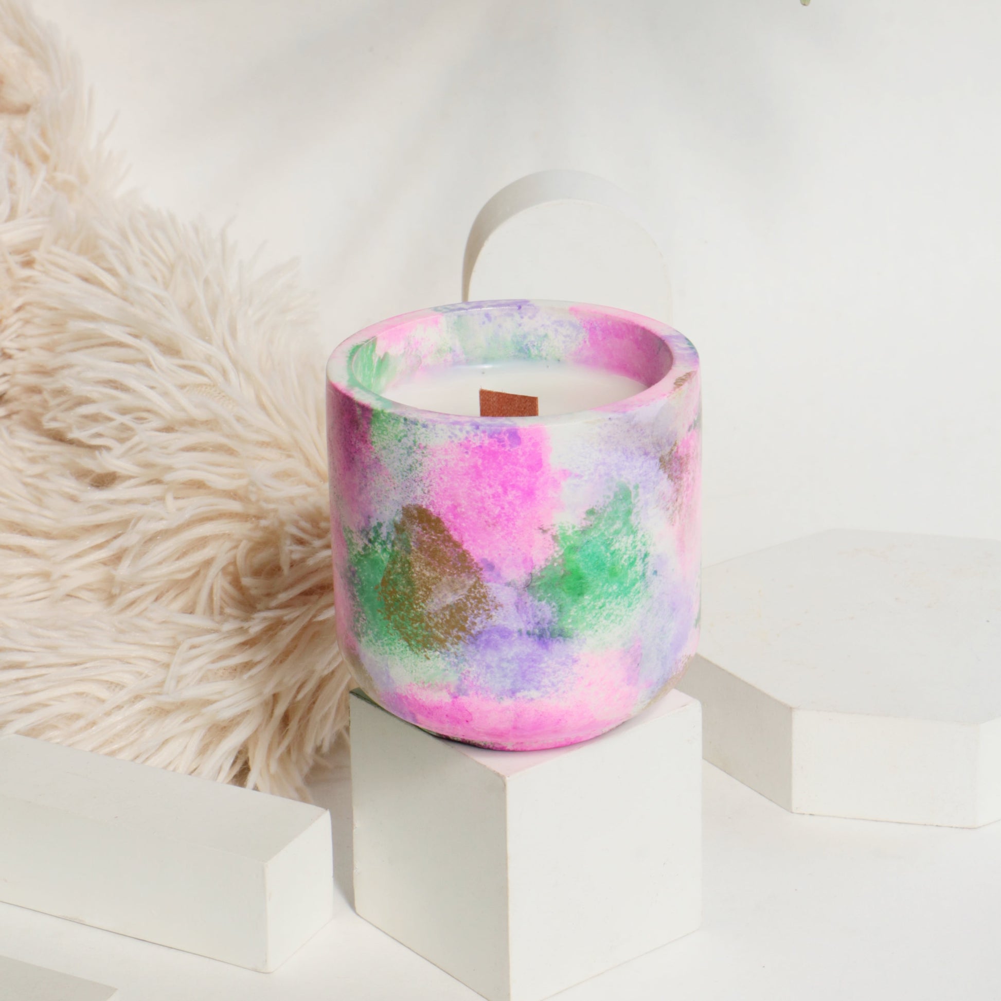 Vanilla candle emitting a sweet and comforting fragrance.